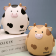 Skarbonka krowa dla dzieci plastikowa 16,5 cm
