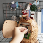 Skarbonka dinozaur jajko elektroniczna muzyczna z kodem